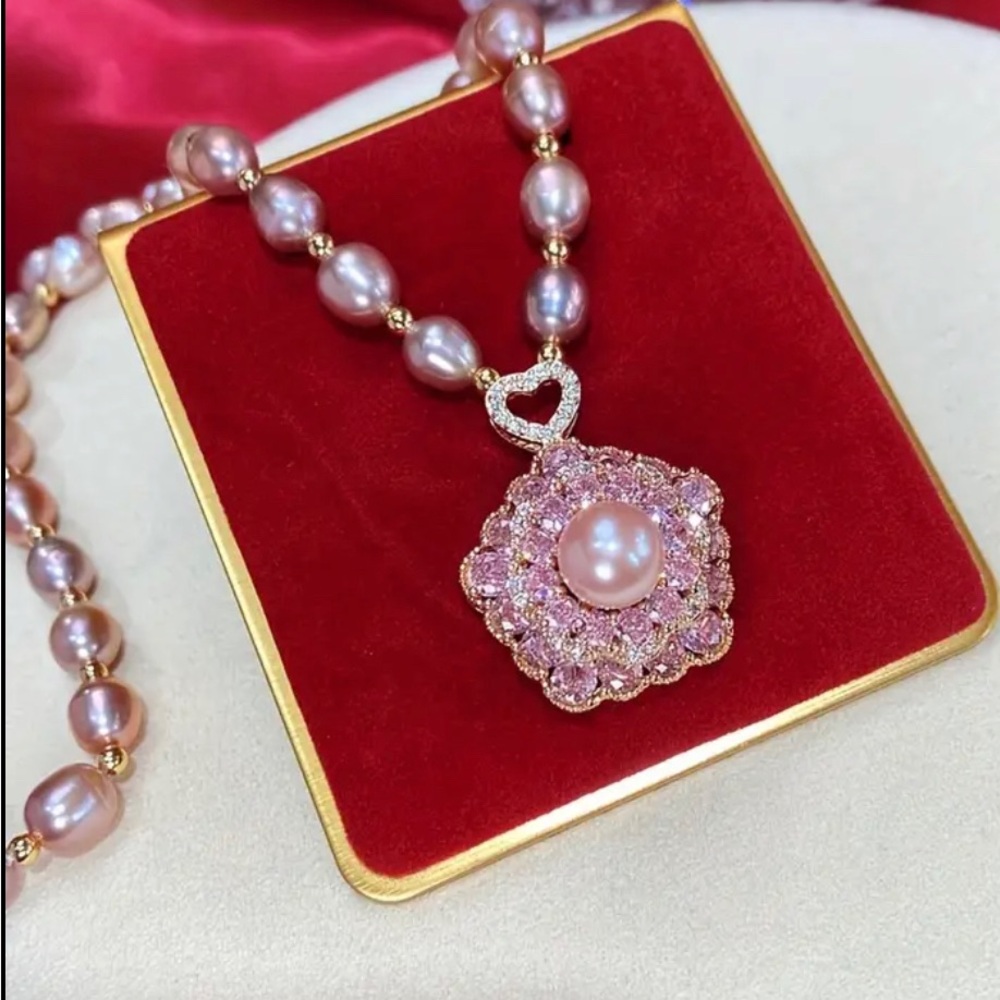 Brand new Beautiful elegant imitation pearl with pink stone rotating pendant